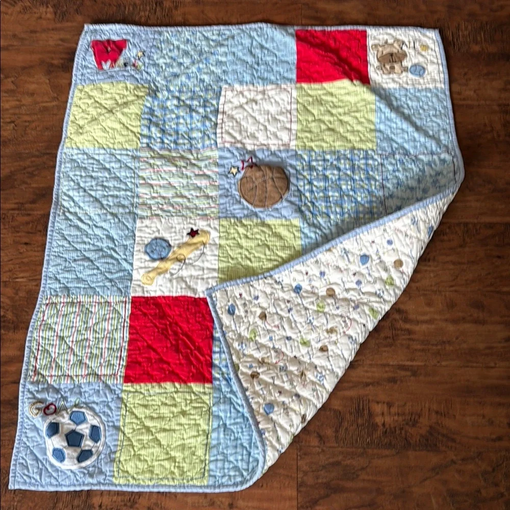 Varsity Baby Quilt with Red and Yellow Accents. Home quilted